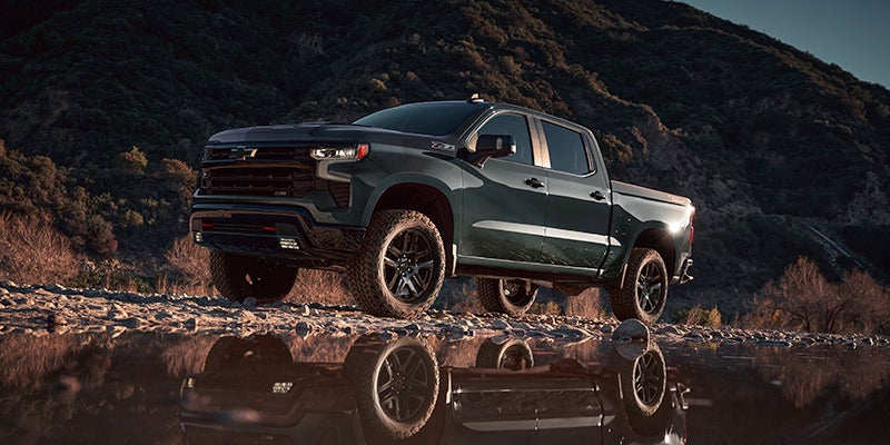 2025 Chevrolet Silverado parked in the mountains